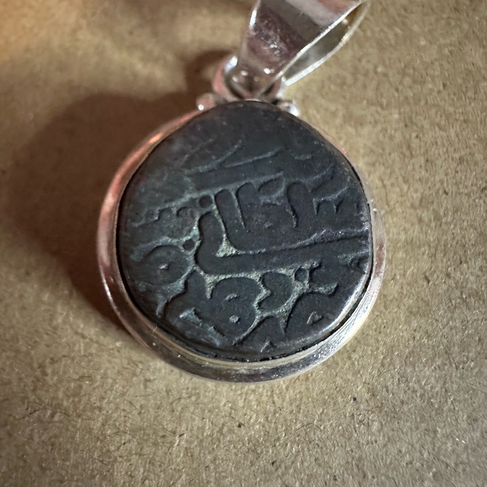 Silver and Black Islamic Stone Pendant